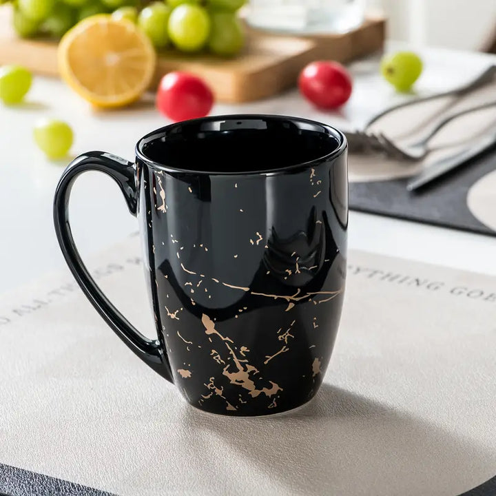 MarbellaGold | 16-Piece Black Porcelain Dinnerware Set with Gold Marble Pattern – Serves 4